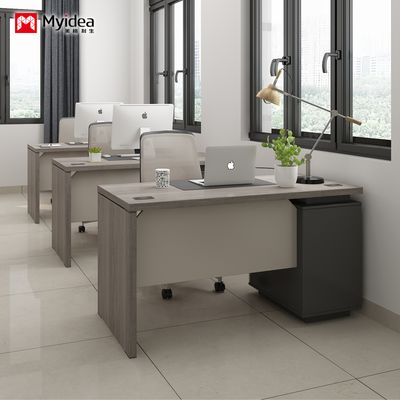 โต๊ะออฟฟิศแบบขั้นต่ําที่ทันสมัย สําหรับเก็บของ โต๊ะคอมพิวเตอร์ที่ใช้ได้ โต๊ะจอจอพนักงานข้างเดียว